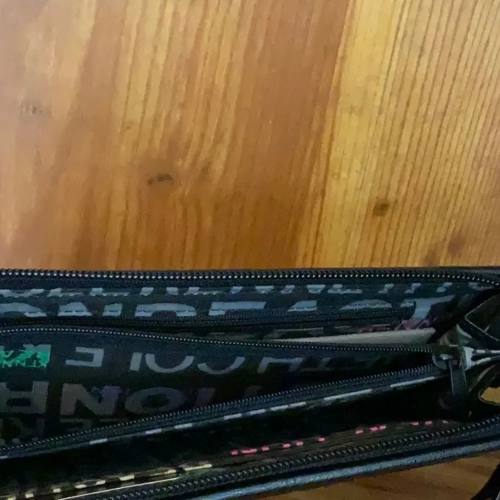 Kenneth Cole Reaction Black Wrislet,‎ Women’s Black Bag